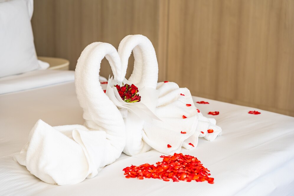 swan towel with red rose flower